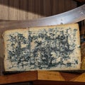 Gorgonzola Cheese and Big Bent Knife Royalty Free Stock Photo