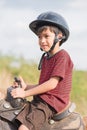 Gorgous Little boy riding horse Royalty Free Stock Photo