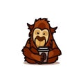 Gorilla monkey drinking coffee Royalty Free Stock Photo