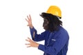 Gorilla with worker clothes and yellow helmet Royalty Free Stock Photo