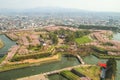 Cherry trees along the moats of Fort Goryokaku as seen from Goryokaku Tower,Hakodate,Hokkaido,Japan in spring.