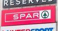 Logo and sign of Spar