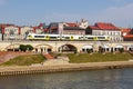 GorzÃÂ³w Wielkopolski town city at river Warta with a regional train type Newag Impuls 2 in Poland Royalty Free Stock Photo