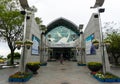 Main building with various dinosaurs display on the roof of Goseong dinosaur museum