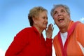 Gossiping senior women Royalty Free Stock Photo