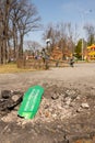 Broken high signpost in park on Ukraine war background