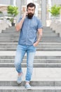 Got it. Business conversation. Man with smartphone. Stylish handsome man with bristle outdoors. Man wearing casual shirt Royalty Free Stock Photo