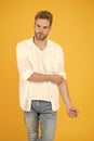 he got great style. portrait of millennial man in casual clothes. Handsome man wear white tshirt and posing in studio Royalty Free Stock Photo