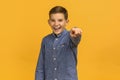 Gotcha. Positive Teen Boy Pointing Finger At Camera And Laughing Royalty Free Stock Photo