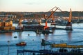 Goteborg industrial harbor port crane at sunset, Gothenburg, Sweden Royalty Free Stock Photo