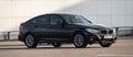 Black 2015 BMW 320D Xdrive car on a parking lot..