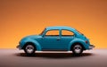 Blue Volkswagen Beetle toy car on orange background.. Royalty Free Stock Photo
