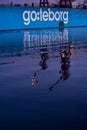 The reflections of the cranes on the dock of the former GÃÂ¶taverken Cityvarvet in Gothenburg, Sweden a beautiful winter afternoon Royalty Free Stock Photo