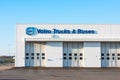 Logo of Volvo Trucks and buses on a white industrial building..