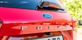 Ford logo on the back of a race red Ford Focus.. Royalty Free Stock Photo