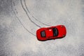 Top view of a red Porsche 911 model car in snow.. Royalty Free Stock Photo