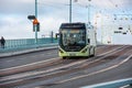 Volvo 7900 Electric bus trafficing the 55 line by Keolis for VÃÂ¤sttrafik passing the GÃÂ¶ta Ãâlv bridge. .. Royalty Free Stock Photo