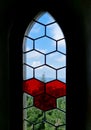 Gothic arch with window glazing in the old way in lead grids that