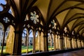 The Gothic arches of Salisbury Cathedral`s cloisters on a sunny spring day Royalty Free Stock Photo