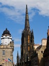 Gothic architecture of Tolbooth Church beside Camera Obscura dome in Edinburgh Scotland Royalty Free Stock Photo