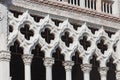 Gothic architecture in Venice with traditional trefoil stone arches and quatrefoil windows