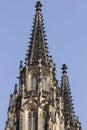 Gothic black tower of St. Vitus cathedral against blue sky in Prague Castle complex, Czech Republic. Great architecture. Royalty Free Stock Photo