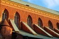 Gothic brick wall with widows - architectural detail of the Saint John the Baptist Cathedral in Ostrow Tumski, Wroclaw, Poland