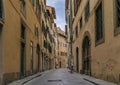 Gothic buildings on a narrow street in Centro Storico of Florence, Italy Royalty Free Stock Photo