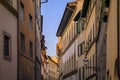 Gothic buildings on a narrow street in Centro Storico of Florence, Italy