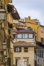 Gothic buildings on a narrow street in Centro Storico of Florence, Italy