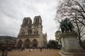 Gothic cathedral in West Portals Facade of Notre Dame, France, historic monuments detail ancient statue art outside of cathoric ch