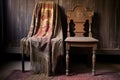 gothic chasuble draped over antique chair Royalty Free Stock Photo