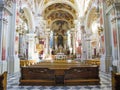 Gothic church interior full of decorations and paintings with altar for mass Royalty Free Stock Photo