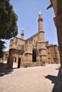 Gothic church St. nicholas rebuilt in addition to serving as a mosque minaret, northern Cyprus. Royalty Free Stock Photo