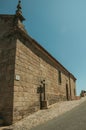 Gothic church with stone wall and cross at Monsanto Royalty Free Stock Photo