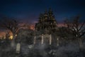 Gothic dark fantasy vampire castle on a misty mountain surrounded by dead trees. 3D illustration