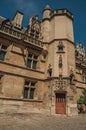 Gothic facade of the Cluny Museum, with a rich collection of medieval art artifacts in Paris. Royalty Free Stock Photo