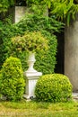 Gothic flower pot in garden.