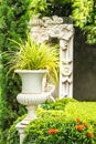 Gothic flower pot in garden.