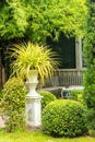 Gothic flower pot in garden.