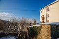 Gothic Fortress walls with a flag on top in winter sunny day  Medieval fortifications  historical and architectural monument Royalty Free Stock Photo