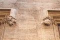 Gothic gargoyle bas relief on an ancient historical building in Valencia