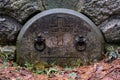 Gothic gravestone on autumn cemetery Royalty Free Stock Photo