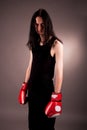 Gothic handsome man with boxing gloves Royalty Free Stock Photo