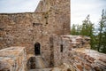 Gothic medieval castle Velhartice in sunny day, tower and stone arch bridge, fortress masonry wall, old stronghold, Velhartice, Royalty Free Stock Photo