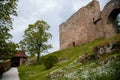 Gothic medieval castle Velhartice in sunny day, tower and stone arch bridge, fortress masonry wall, old stronghold, Velhartice, Royalty Free Stock Photo