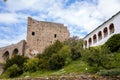 Gothic medieval castle Velhartice, sunny day, white mansion, facade with arches, masonry wall, old stronghold with tower, Royalty Free Stock Photo