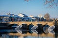 Gothic medieval Stony Deer bridge with show Riverbank of the Otava river in winter sunny day the oldest bridge in historical