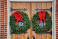 Church doors with wreaths Royalty Free Stock Photo