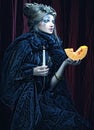 Gothic portrait of woman with candle. Royalty Free Stock Photo
